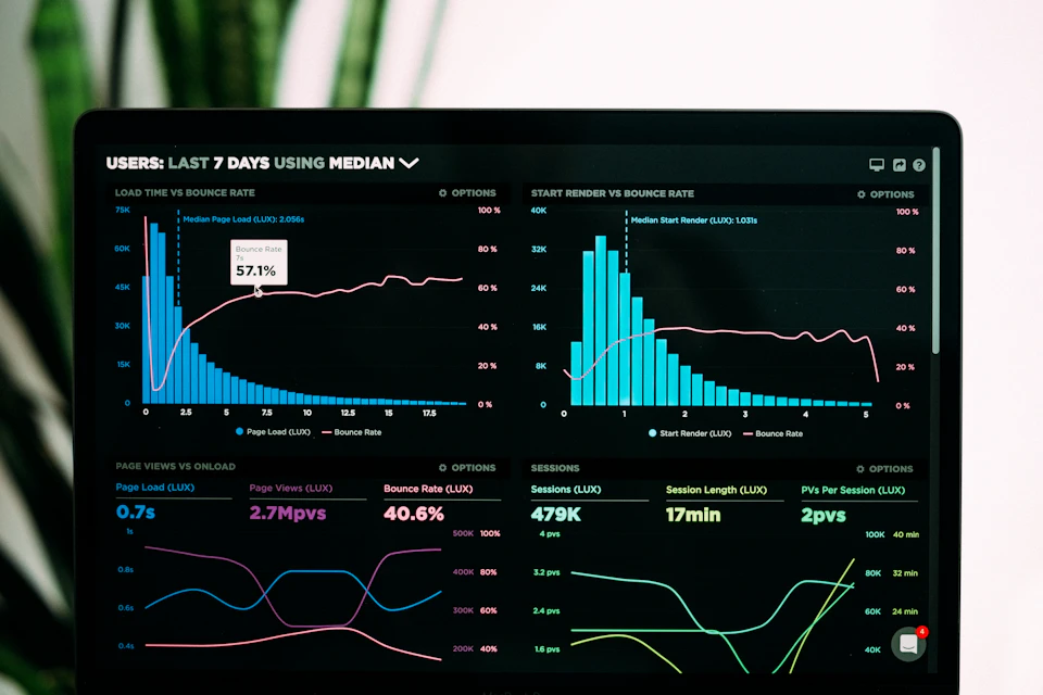 Laptop screen showing clean engagement analytics dashboards